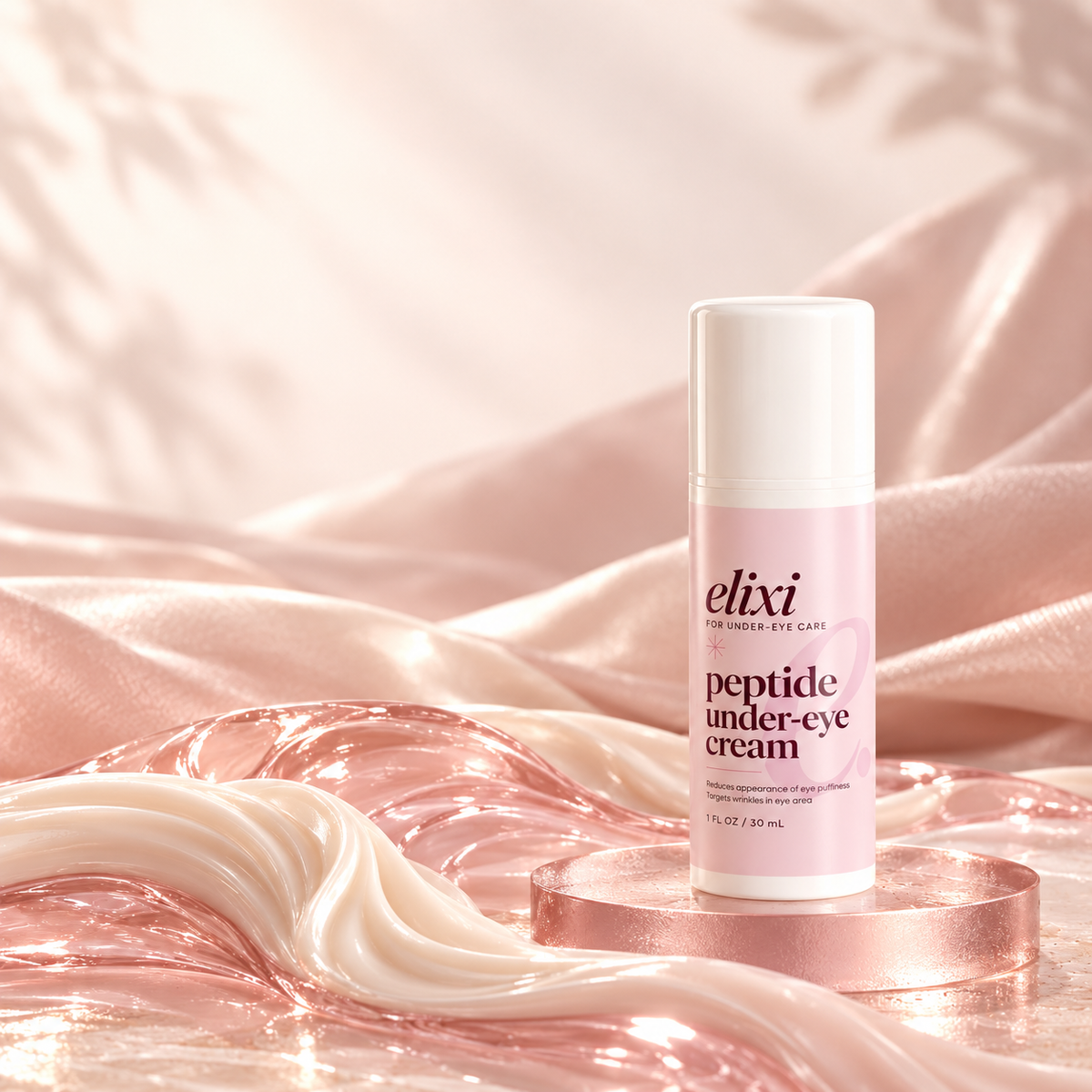 Elixi Peptide Under-Eye Cream on a frosted rose-glass riser surrounded by pearly cream and blush gel waves.