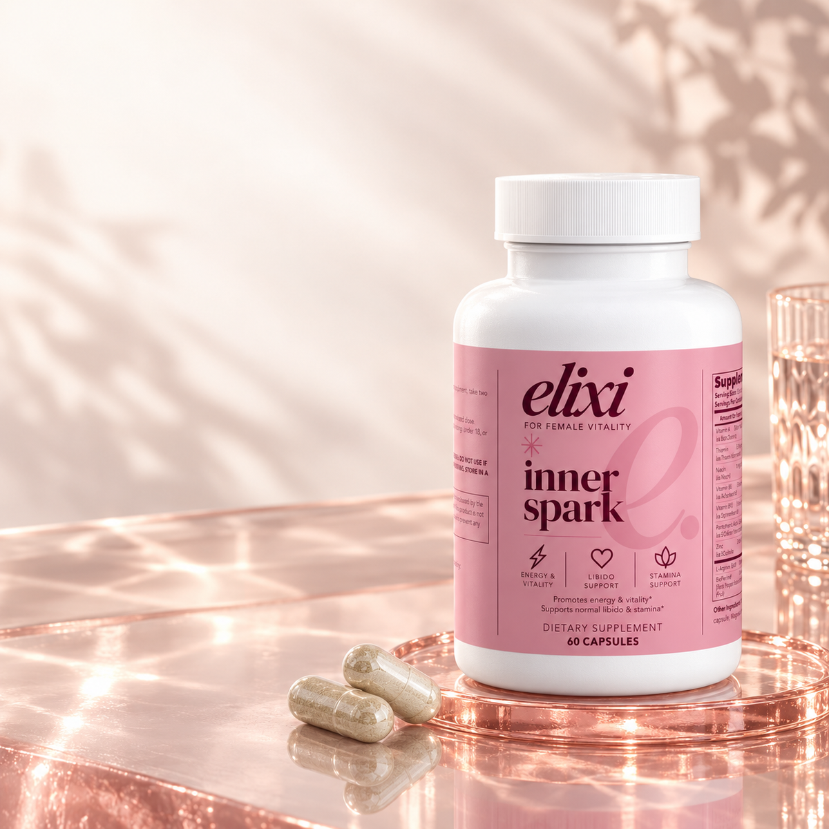 Inner Spark supplement bottle with its pink Elixi label.