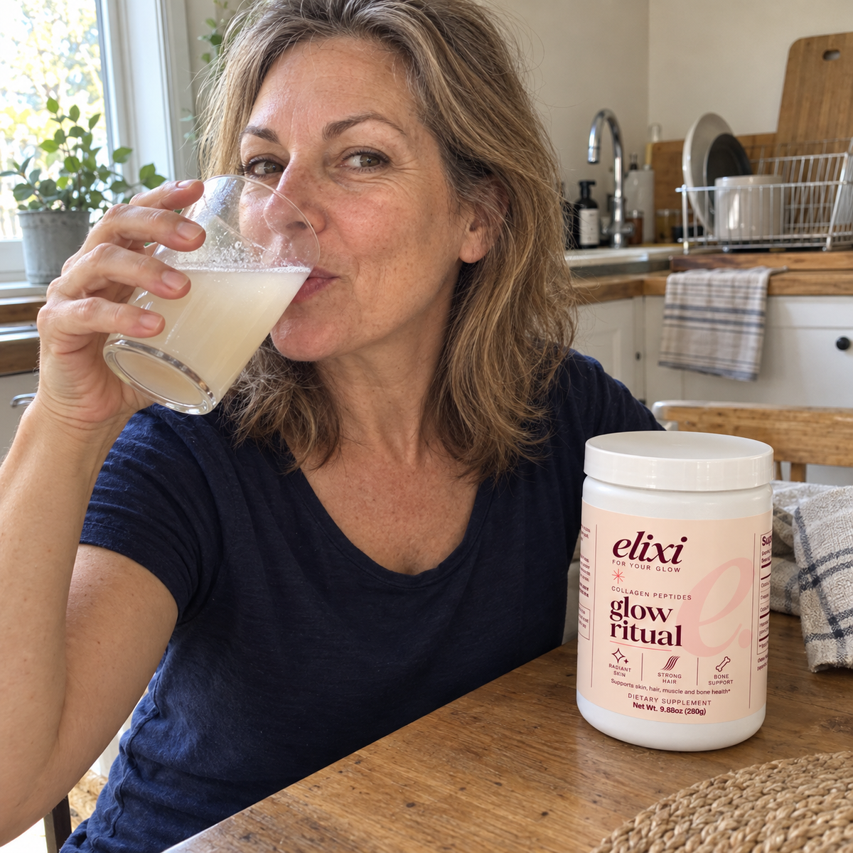 Woman drinking beside a jar of Elixi Glow Ritual collagen